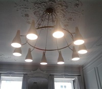 Big chandelier installed on a 12' ceiling in Midtown New York, NY.